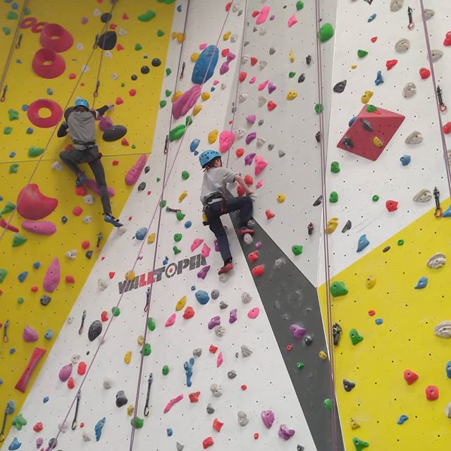 Losing my little rockstar up a wall at Rockstar climbing!