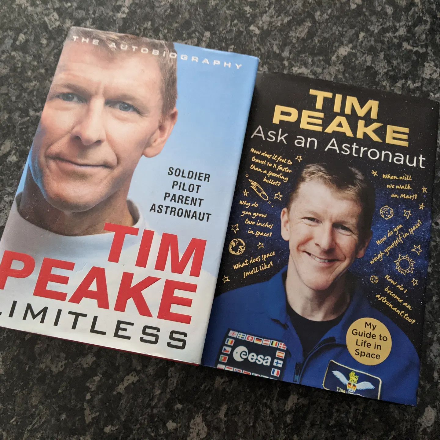 Not sure which of us is more excited about the eldest's Christmas present this evening, off to see @astro_timpeake in Oxford!Books going into bag just in case one scout gets to meet another!#scouts #scouting #space #timpeake